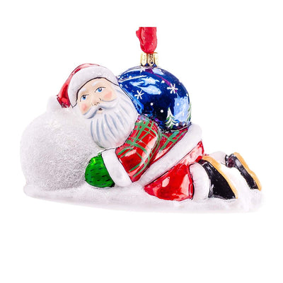 Santa Lounging On Snowball Ornament